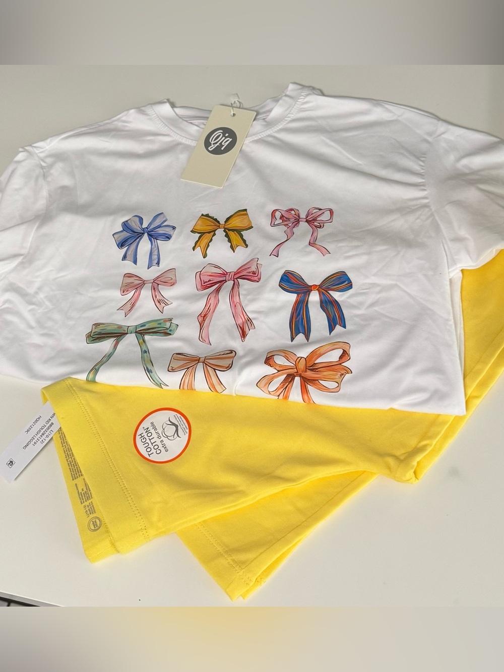 Set of White Tee with Colorful Bow Print & Yellow Leggings. Size 10-12